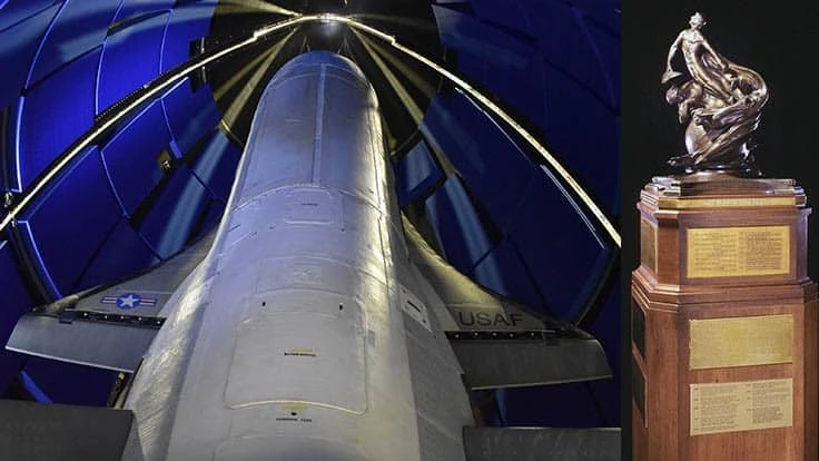 X-37B shown with Robert J. Collier Trophy displayed permanently at the National Air and Space Museum