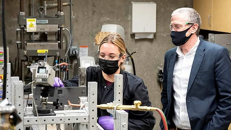 Rod Trice, an engineer in Purdue’s School of Materials Engineering, works with graduate student Averyonna Kimery in the Trice Ceramics Lab to set-up an ablation experiment, subjecting a test material to extreme heat. 