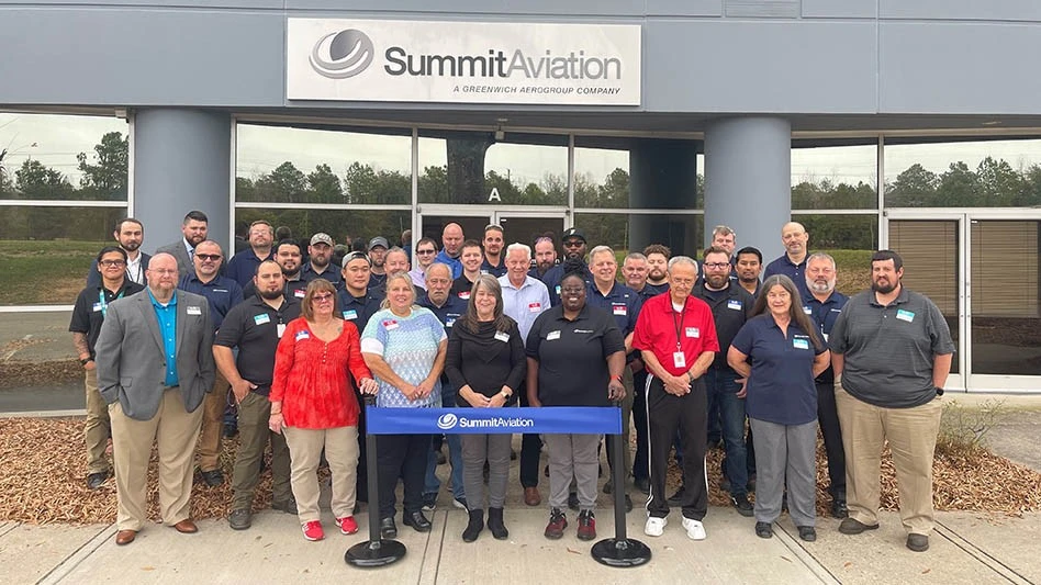 Summit Aviation employees celebrate new location.