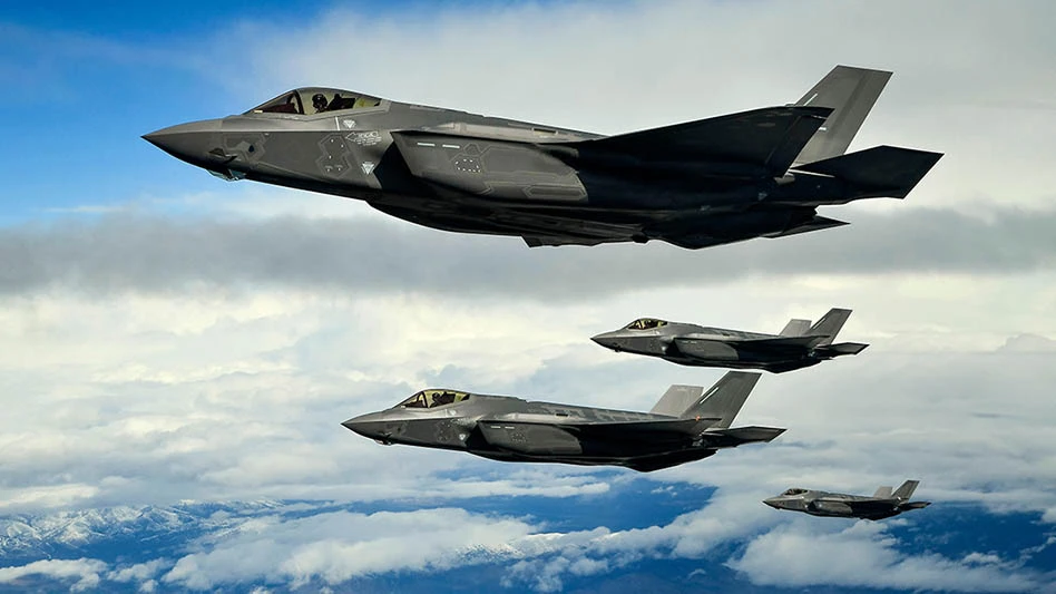F-35A Lightning IIs fly in formation.