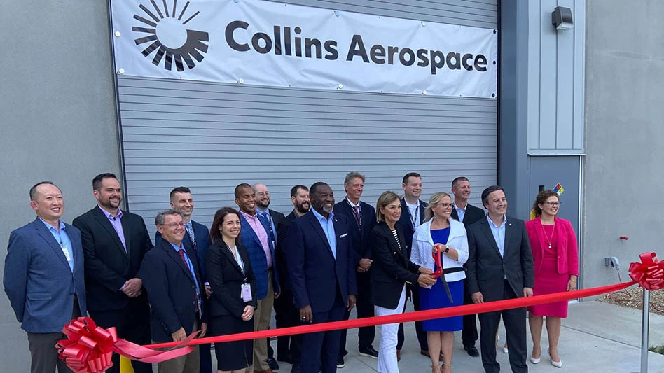Collins Aerospace leaders join with Iowa Gov. Kim Reynolds to cut the ribbon on a $14 million additive manufacturing center expansion at the company's facility in West Des Moines.