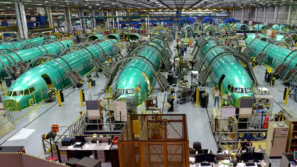 factory assembly floor with airplane fuselages
