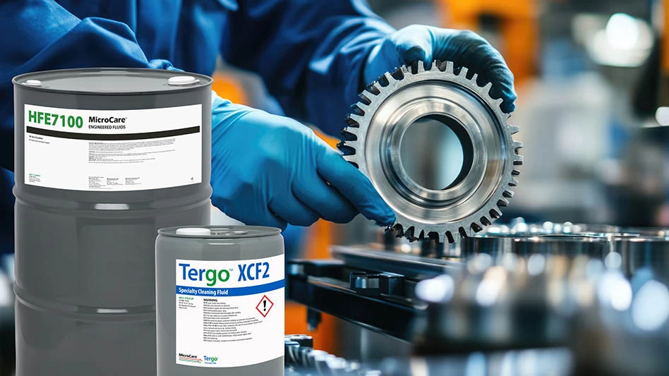 barrels in front of hands cleaning gears