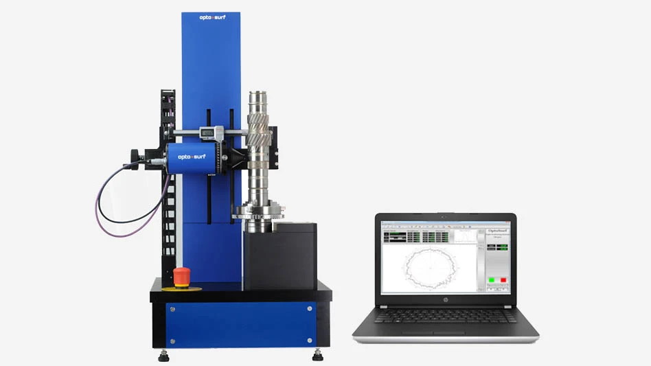optical measuring device next to a laptop