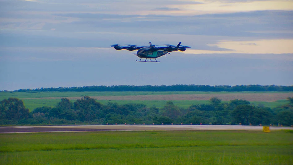 air taxi in flight over landscape