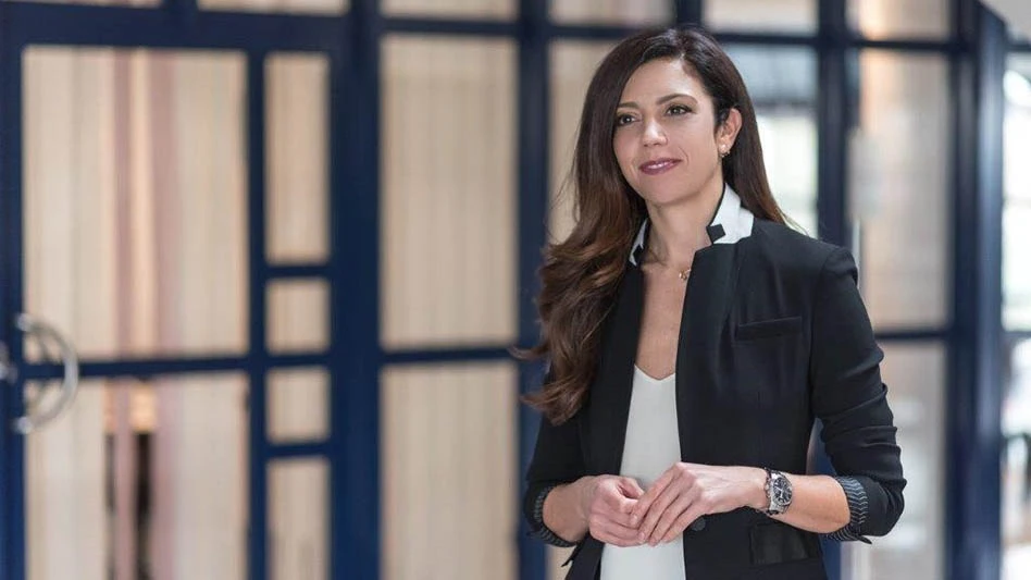 woman standing outside of a doorway