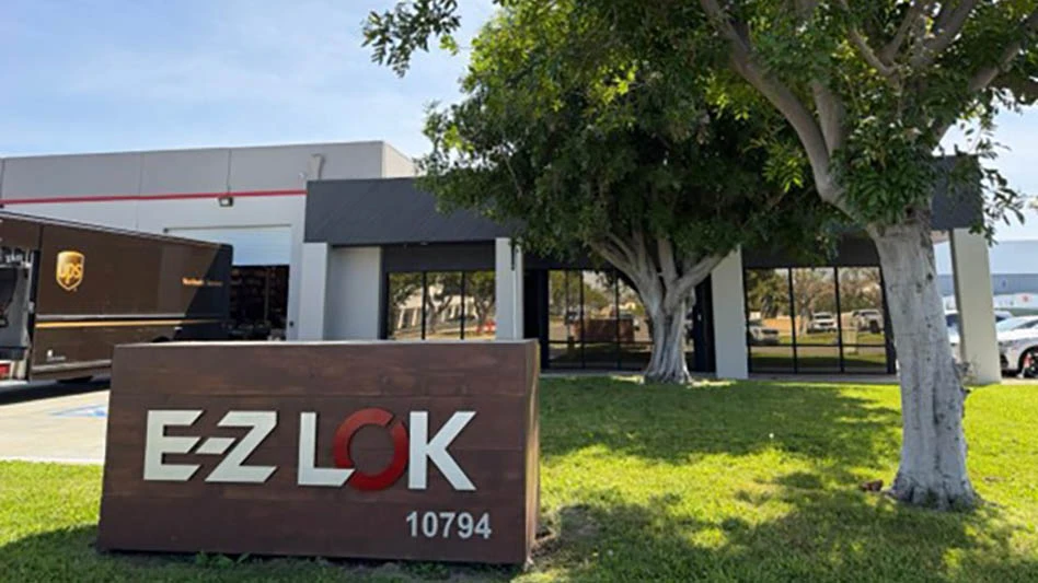 sign with e-z lok wording on a yard in front of a building